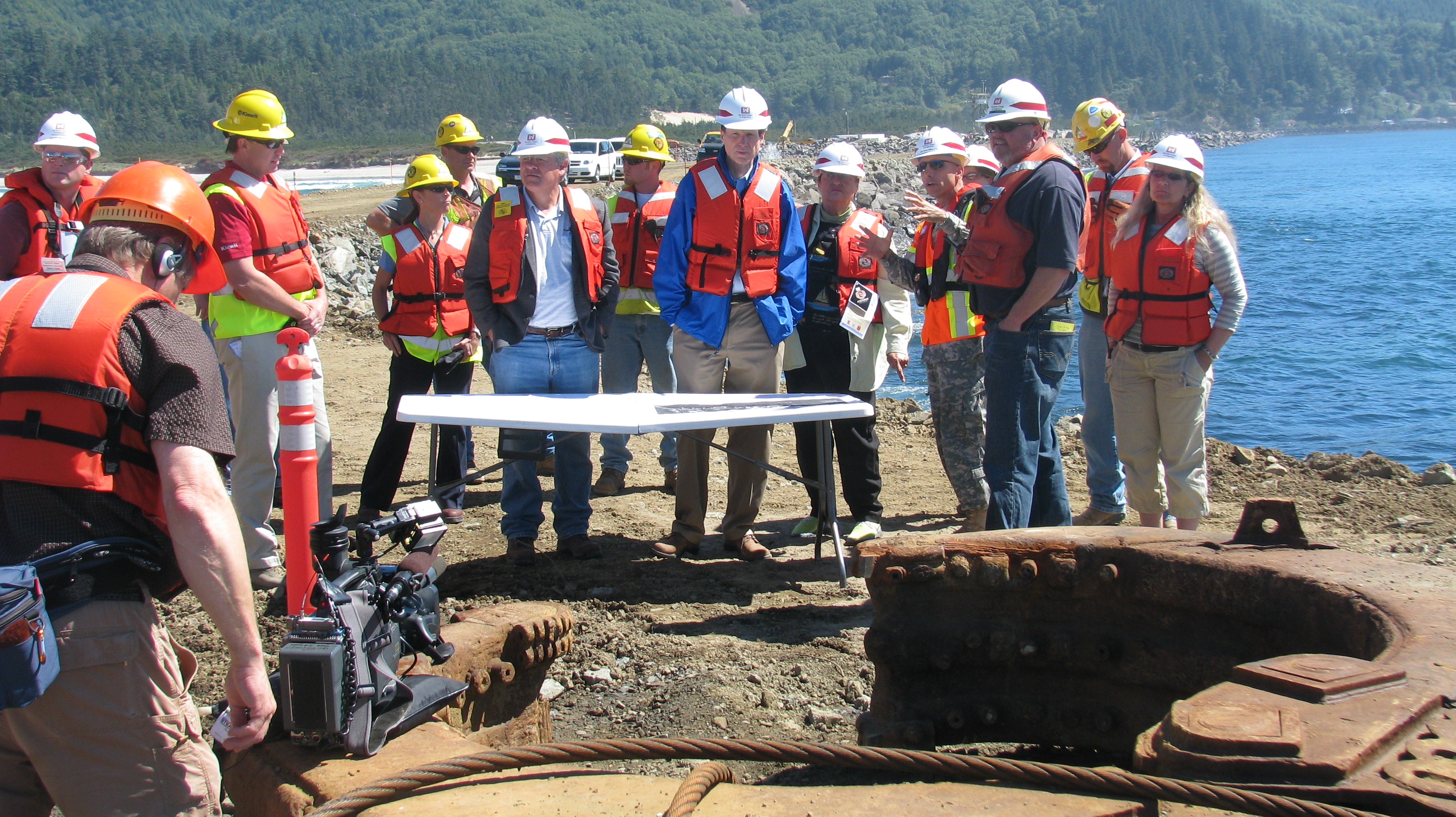 Sen. Wyden joins local officials, contractors and representatives of the Army Corps of Engineers and Pacific NW Waterways Assoc. at the end of the North Jetty at Tillamook Bay.